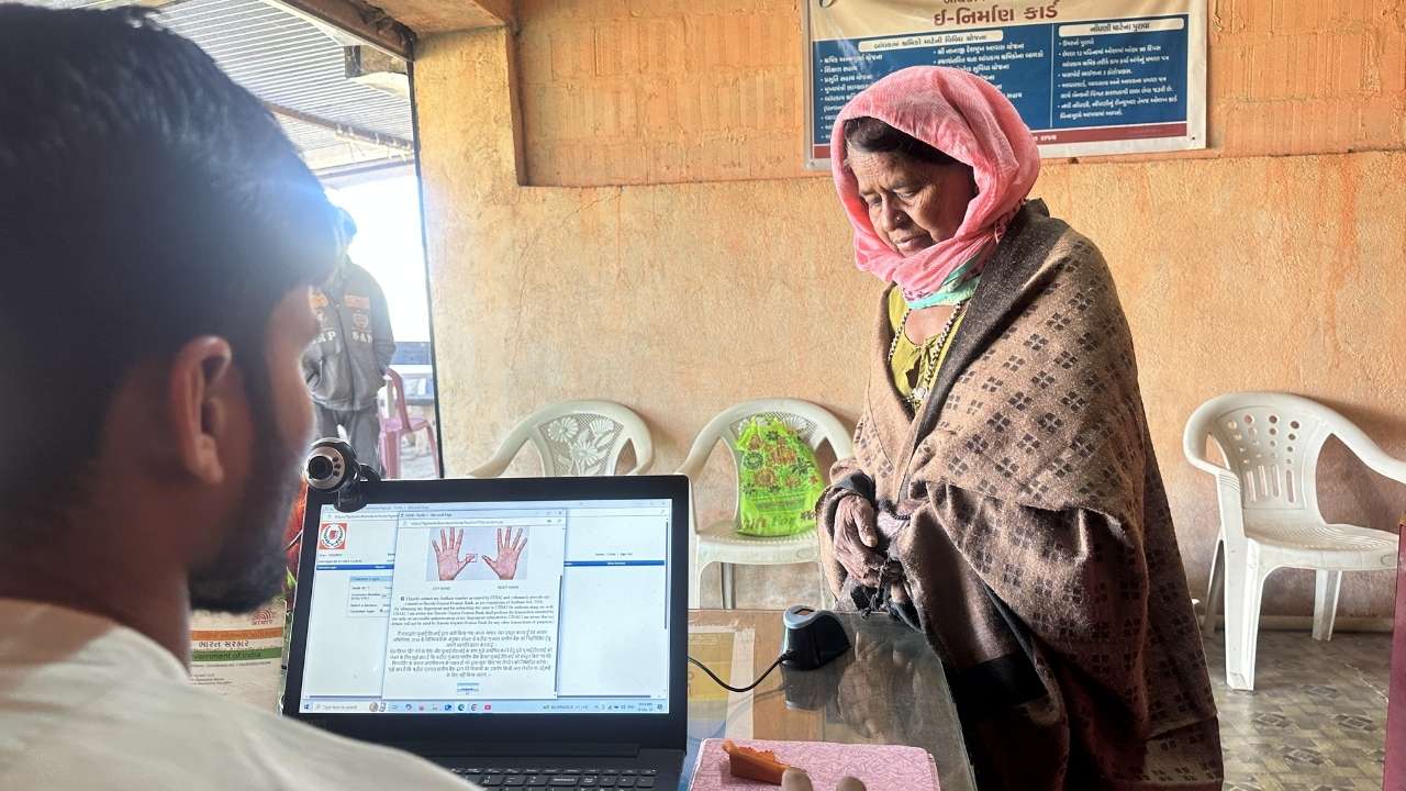 Farmer interacting with an official at a Common Service Center (CSC)