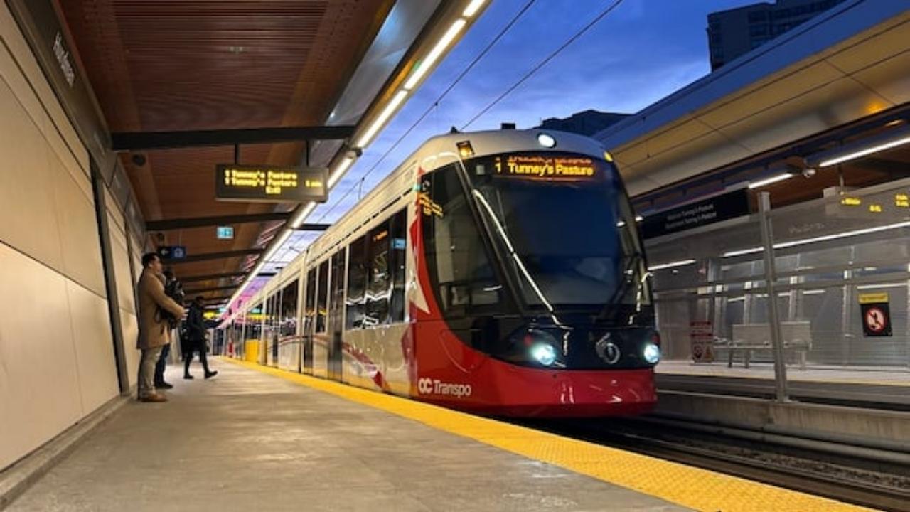 OC Transpo light rail train at a station in Ottawa